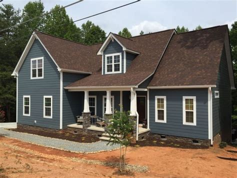 house colors with brown metal roof|house colors with brown trim.